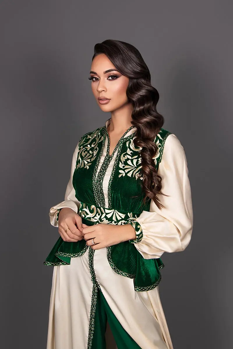 Women's ivory kaftan with green silk cloth trousers and a bottle-green velvet vest