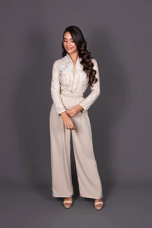 Kaftan jumpsuit for a Moroccan wedding in beige lace