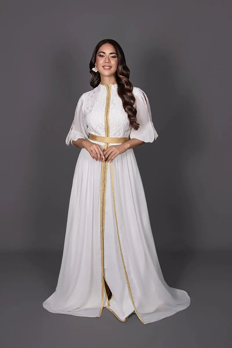 white and gold kaftan dress for a Moroccan wedding