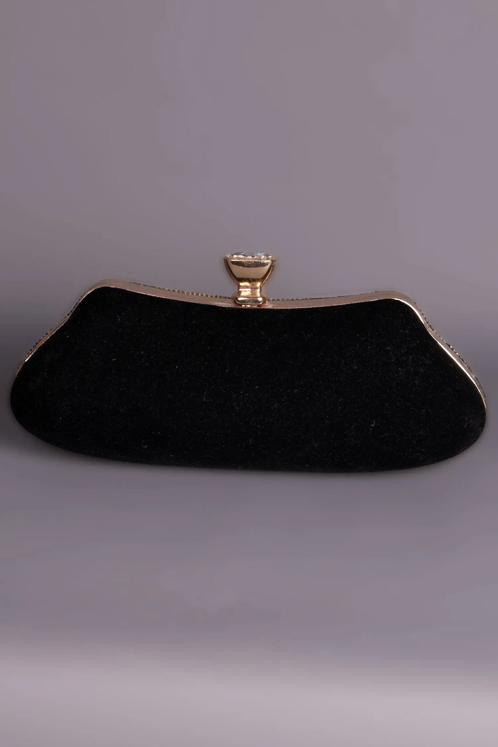 bolso de noche negro y dorado a juego con los caftanes marroquíes de la gama negro intenso