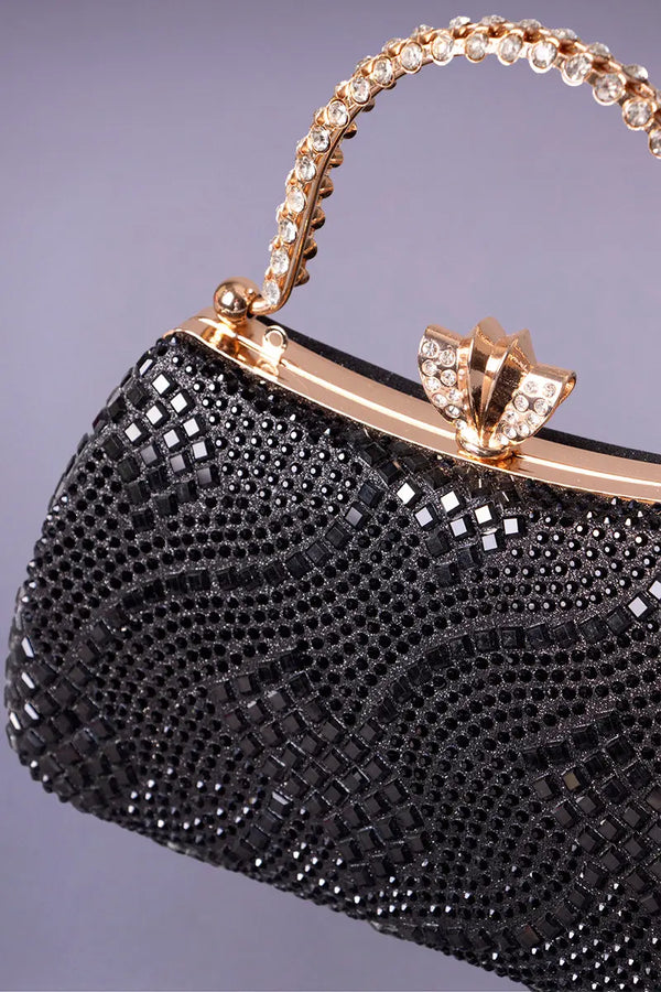 Black and gold minaudière for a black and gold kaftan