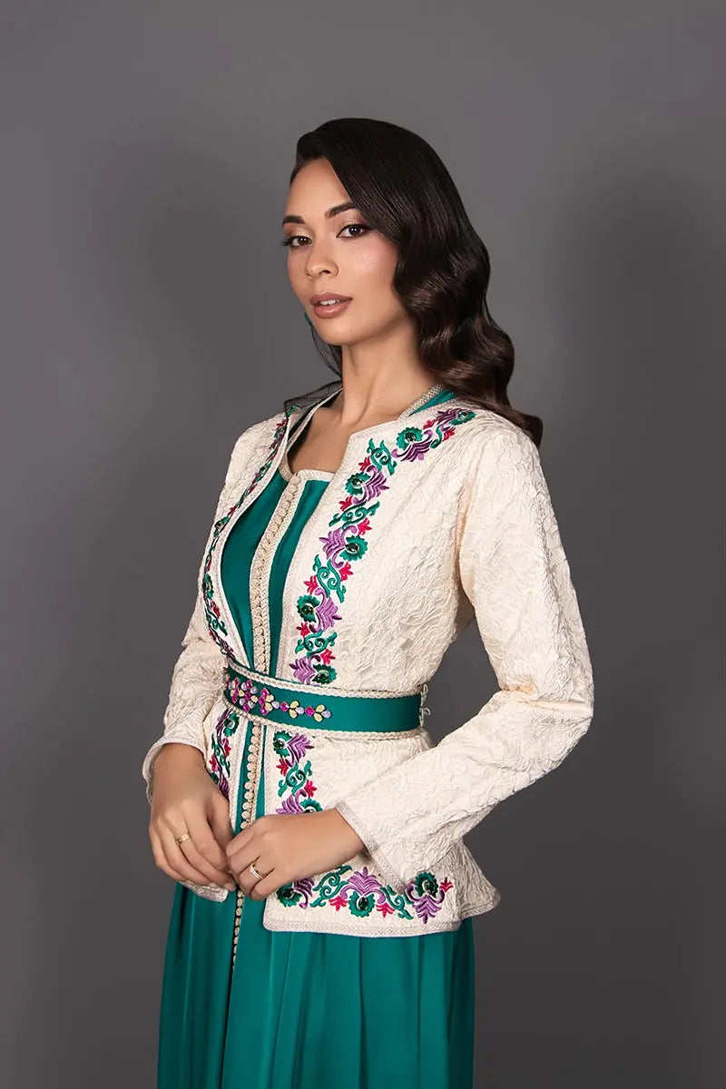Women’s Moroccan kaftan with a colorful embroidered jacket for wedding celebrations